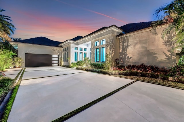 view of front of home with a garage