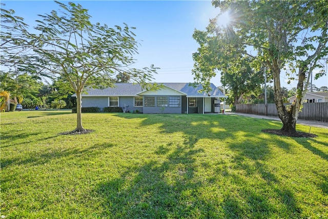 view of yard with fence