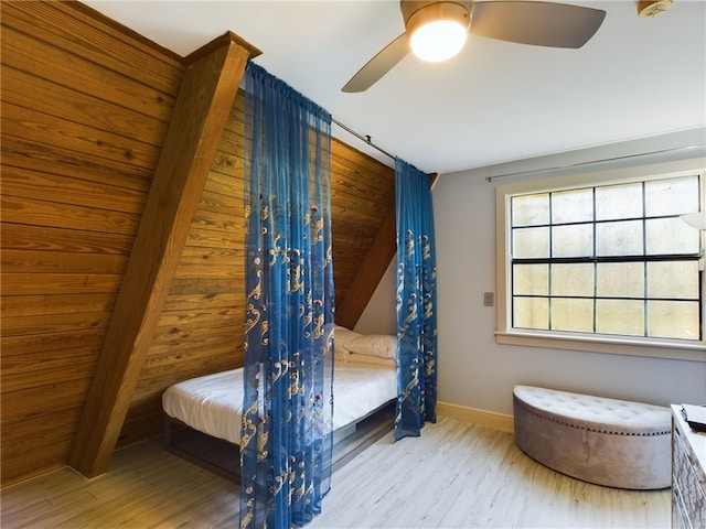 bedroom featuring light hardwood / wood-style floors and ceiling fan