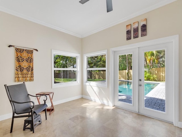 sunroom with french doors and ceiling fan