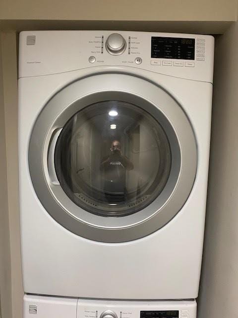 30 Plantation Dr Unit 104, Vero Beach, FL 32966 - washroom with estacked washer and dryer