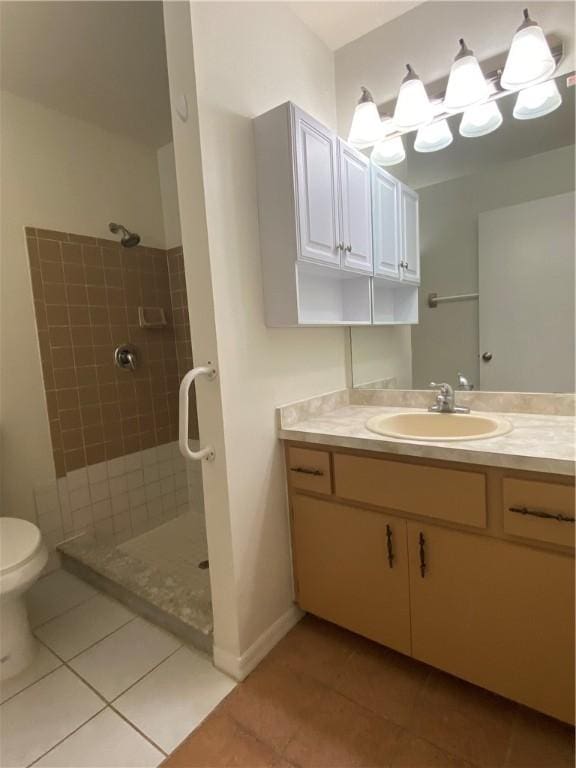 473 Englar Dr, Sebastian, FL 32958 - bathroom featuring tile patterned flooring, tiled shower, and vanity