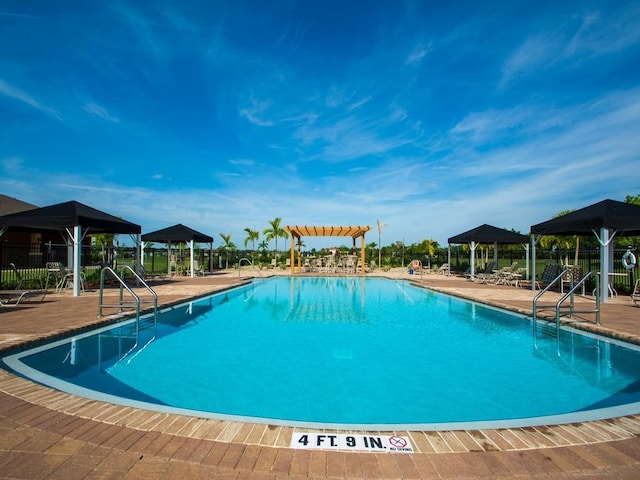 2641 Crowned Eagle Cir SW, Vero Beach, FL 32962 - community pool with a gazebo and a patio