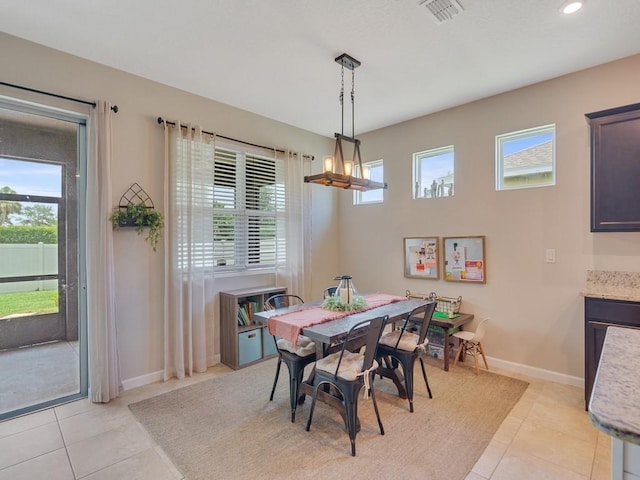 2641 Crowned Eagle Cir SW, Vero Beach, FL 32962 - dining area with plenty of natural light, light tile patterned floors, and recessed lighting