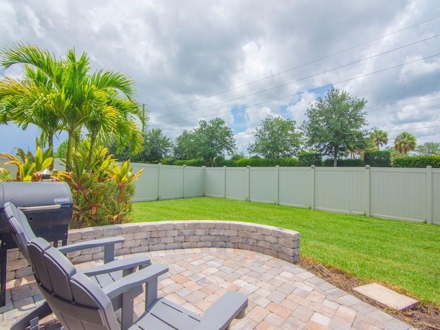 2641 Crowned Eagle Cir SW, Vero Beach, FL 32962 - fenced backyard featuring a patio