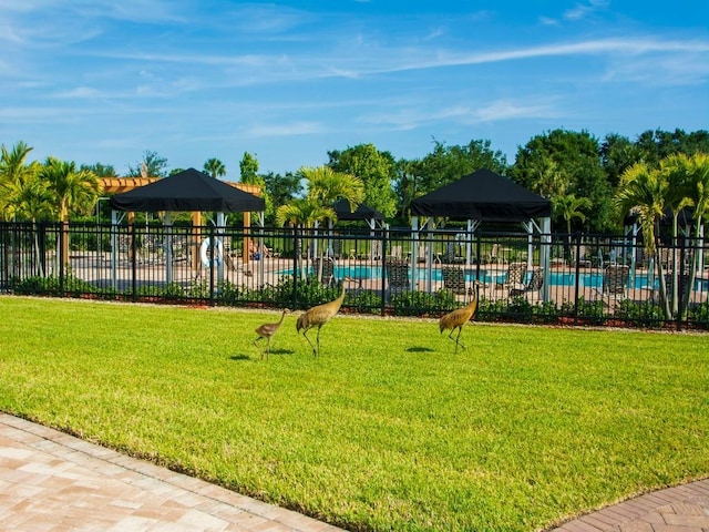 2641 Crowned Eagle Cir SW, Vero Beach, FL 32962 - surrounding community featuring a pool