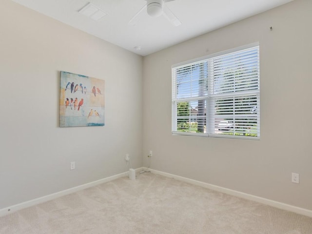 2641 Crowned Eagle Cir SW, Vero Beach, FL 32962 - empty room featuring light carpet and ceiling fan