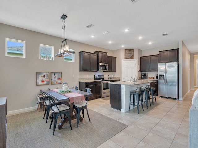 2641 Crowned Eagle Cir SW, Vero Beach, FL 32962 - dining space featuring recessed lighting and light tile patterned floors