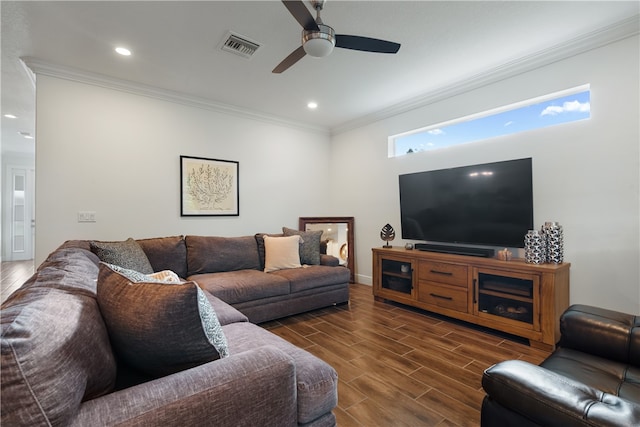 living room featuring crown molding and ceiling fan