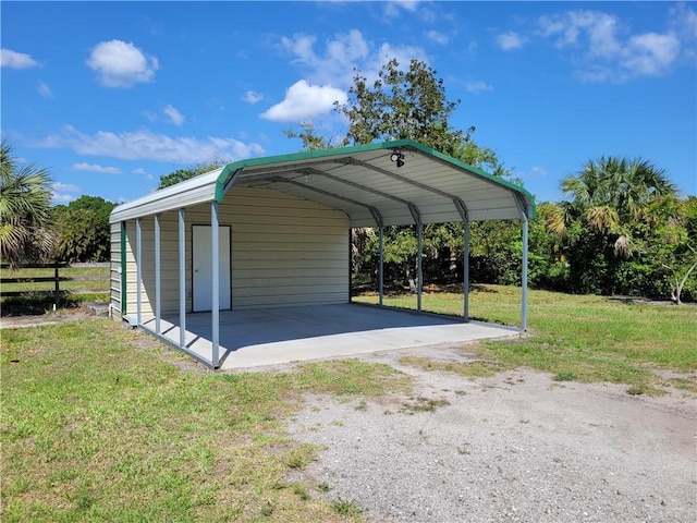 view of vehicle parking featuring a carport and driveway