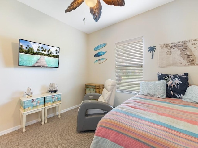 bedroom featuring light carpet and ceiling fan