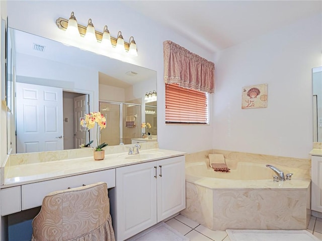 bathroom with tile patterned floors, vanity, and plus walk in shower