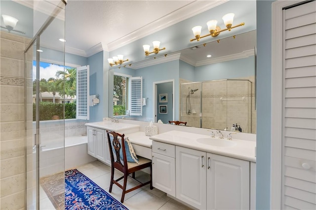 bathroom with ornamental molding, separate shower and tub, tile patterned flooring, and vanity