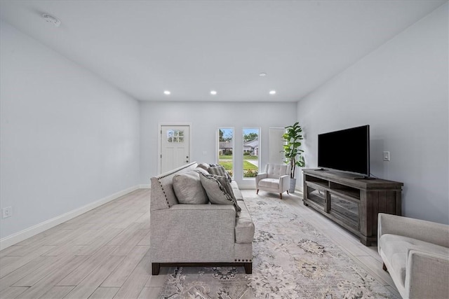7160 Carlowe Ave, Cocoa, FL 32927 - living area featuring light wood-style floors and recessed lighting
