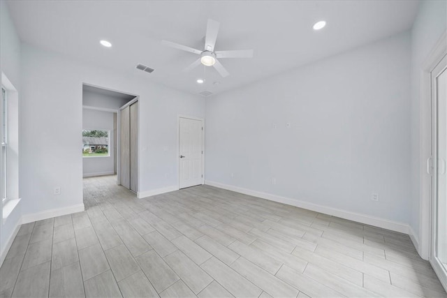 7160 Carlowe Ave, Cocoa, FL 32927 - empty room with a ceiling fan, recessed lighting, and light wood finished floors