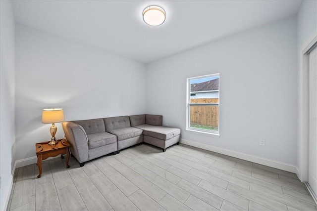 7160 Carlowe Ave, Cocoa, FL 32927 - living room with baseboards and light wood-style flooring