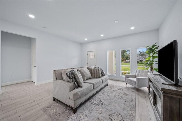 7160 Carlowe Ave, Cocoa, FL 32927 - living area with recessed lighting and light wood finished floors