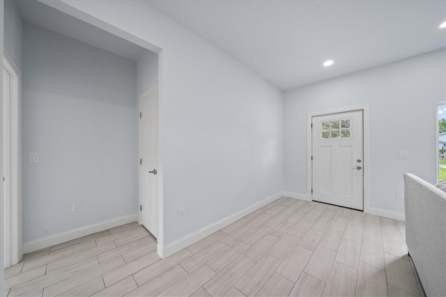 7160 Carlowe Ave, Cocoa, FL 32927 - entrance foyer with wood finish floors and recessed lighting