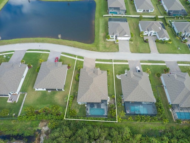 drone / aerial view featuring a water view