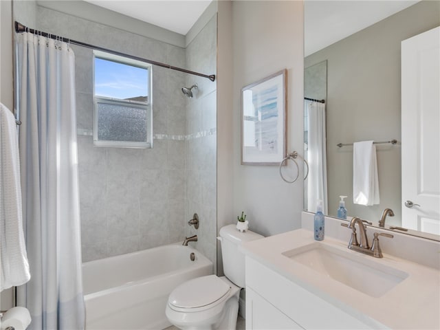 full bathroom with vanity, toilet, and shower / bath combo with shower curtain