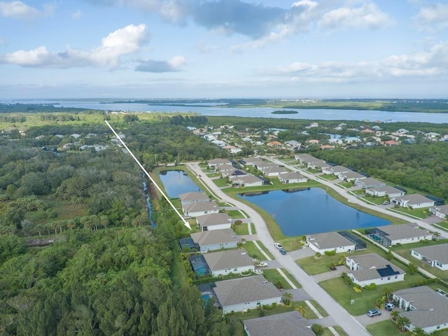 drone / aerial view with a water view