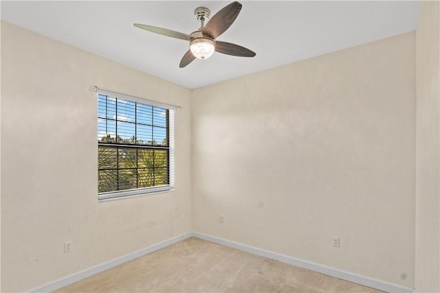 10008 W Villa Cir Unit 10008, Vero Beach, FL 32966 - unfurnished room with baseboards, light colored carpet, and ceiling fan