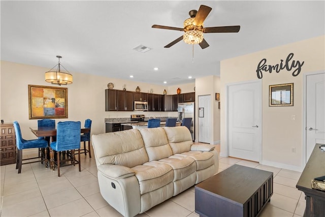 10008 W Villa Cir Unit 10008, Vero Beach, FL 32966 - living area featuring visible vents, baseboards, recessed lighting, a ceiling fan, and light tile patterned floors