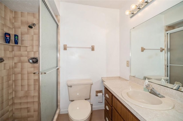 6001 Palm Dr, Fort Pierce, FL 34982 - full bathroom featuring vanity, a shower stall, toilet, and tile patterned floors