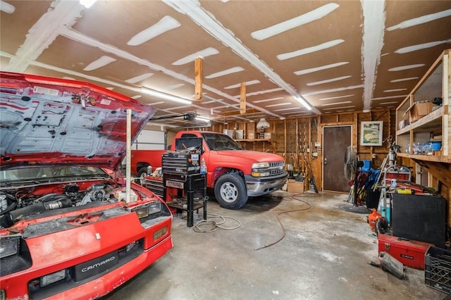 6001 Palm Dr, Fort Pierce, FL 34982 - garage featuring a garage door opener
