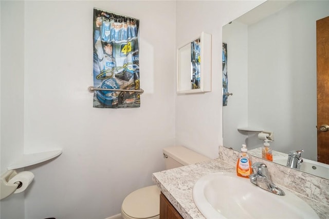 6001 Palm Dr, Fort Pierce, FL 34982 - bathroom with toilet and vanity