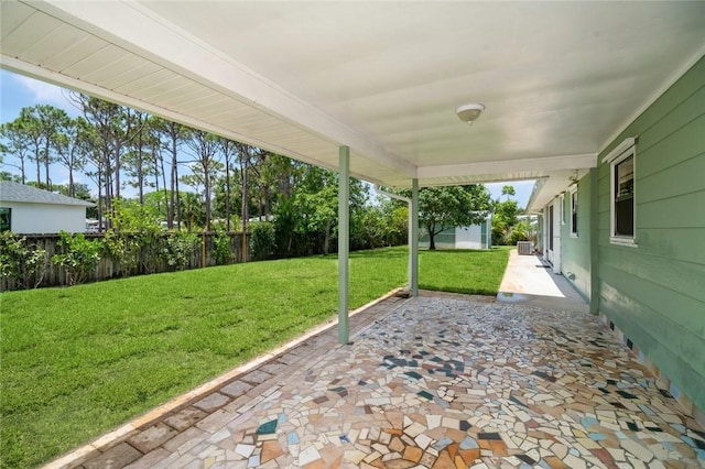 6001 Palm Dr, Fort Pierce, FL 34982 - view of yard featuring a patio area