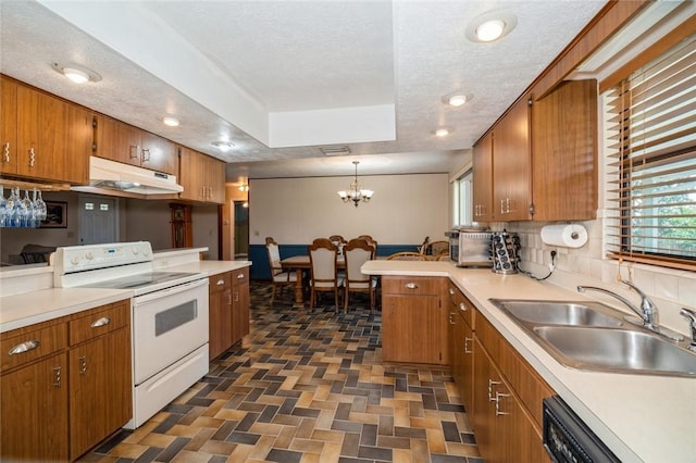 6001 Palm Dr, Fort Pierce, FL 34982 - kitchen with white range with electric cooktop, under cabinet range hood, a sink, dishwasher, and brown cabinets