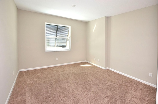 3951 Playa Del Sol Dr Unit 201, Rockledge, FL 32955 - empty room with baseboards and carpet