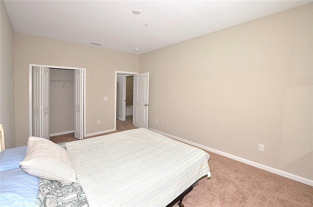 3951 Playa Del Sol Dr Unit 201, Rockledge, FL 32955 - carpeted bedroom featuring baseboards and a closet