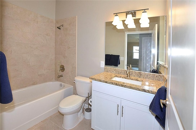 3951 Playa Del Sol Dr Unit 201, Rockledge, FL 32955 - bathroom featuring shower / bathtub combination, tile patterned floors, vanity, and toilet