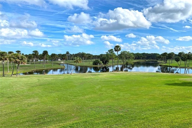 3951 Playa Del Sol Dr Unit 201, Rockledge, FL 32955 - view of property's community featuring a water view and a yard