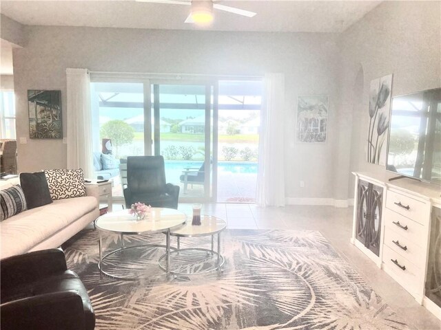 living room featuring ceiling fan