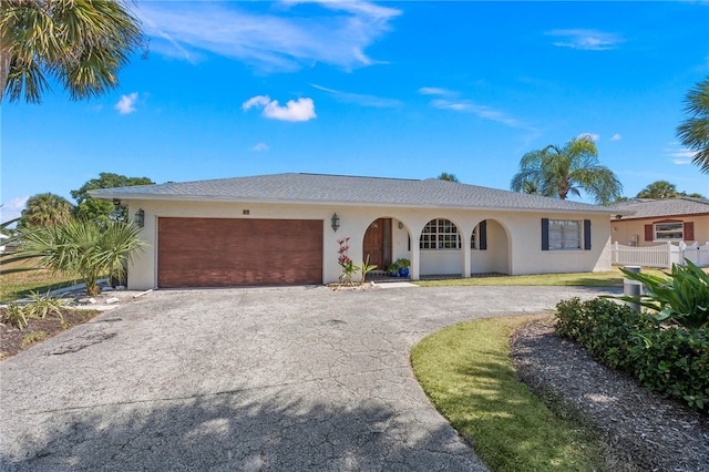 ranch-style home with a garage