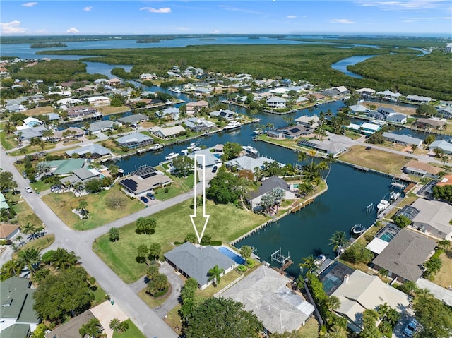 drone / aerial view with a water view