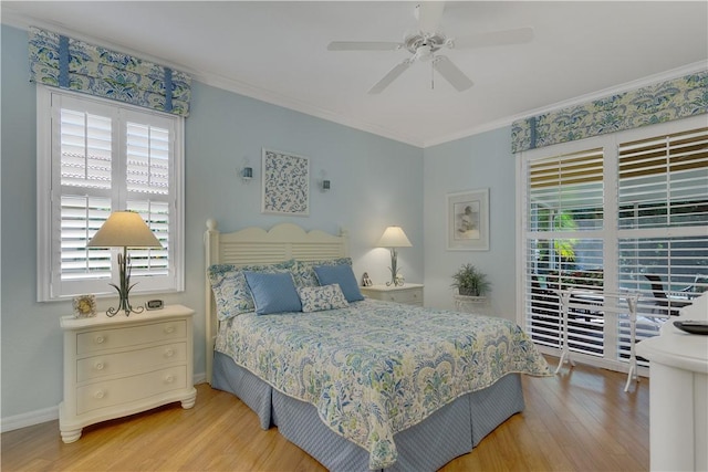6341 Astor Pl, Vero Beach, FL 32966 - bedroom featuring wood finished floors, ornamental molding, baseboards, and a ceiling fan