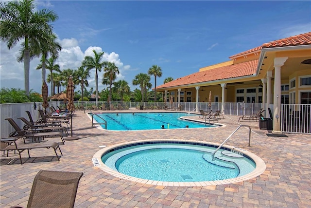 6341 Astor Pl, Vero Beach, FL 32966 - community pool featuring a patio and a hot tub