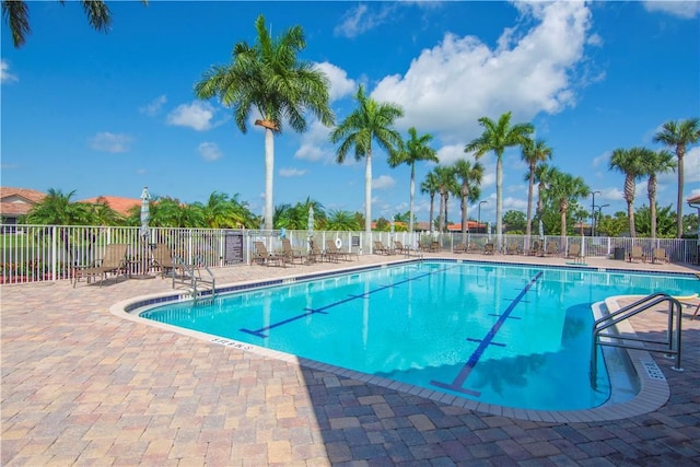 6341 Astor Pl, Vero Beach, FL 32966 - community pool featuring a patio area