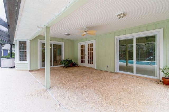 view of patio with french doors and ceiling fan