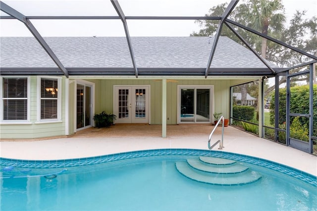 view of pool featuring french doors and a patio area