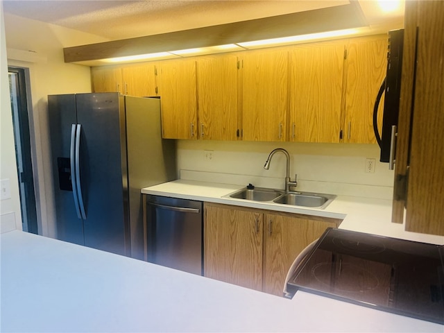 kitchen featuring sink and appliances with stainless steel finishes