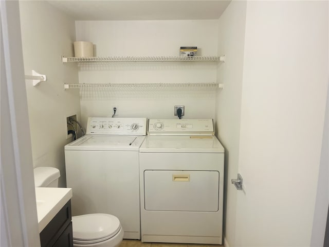 washroom with washer and clothes dryer