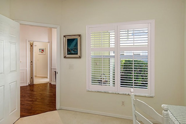 corridor featuring hardwood / wood-style flooring