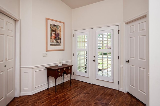 entryway with french doors and dark hardwood / wood-style flooring