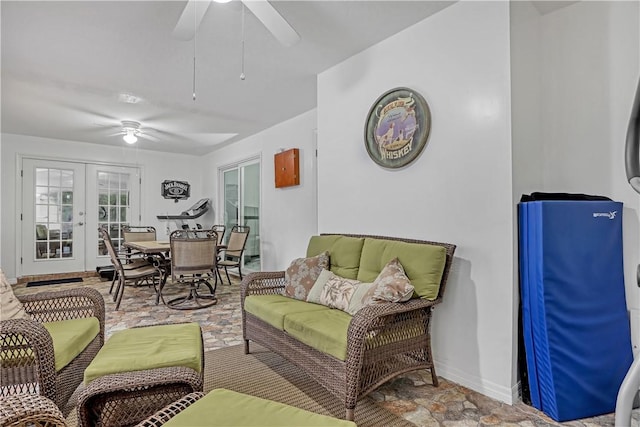 interior space featuring french doors and ceiling fan