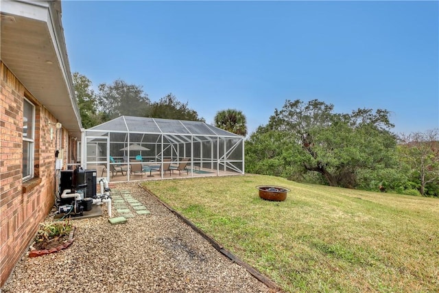 view of yard featuring a patio and a fire pit